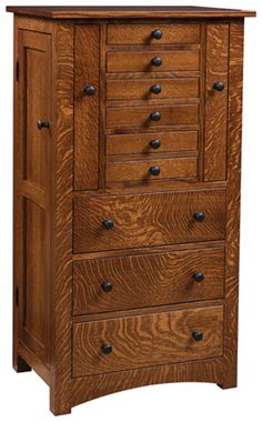 a wooden chest with five drawers and two doors