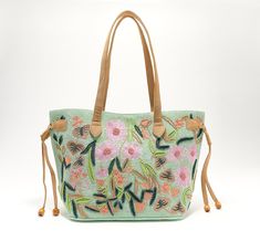 Is a joyful carry your jam? This beautifully embroidered and beaded tote delivers the smiles with each and every reach -- whether you designate it for the beach, your commute, or elegant daytrips. From America & Beyond. Spring Embroidered Tote Beach Bag, Spring Embroidered Beach Bag Tote, Embroidered Tote Beach Bag For Shopping, Spring Vacation Embroidered Bag, Spring Vacation Embroidered Bags, Green Beaded Bags For Daily Use, Embroidered Beach Bag For Everyday Summer Use, Summer Embroidered Beach Bag For Everyday Use, Summer Embroidered Shoulder Bag For Shopping