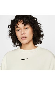 An embroidered Swoosh adds minimal branding to this cozy fleece sweatshirt cut for a relaxed, oversized fit that's enhanced by the dropped shoulders. 22" length (size Medium) Crewneck 80% cotton, 20% polyester Machine wash, tumble dry Imported Nike Sportswear Phoenix Fleece, Ultras Football, Studded Accessories, Luxury Loungewear, Oversized Crewneck, Women's World Cup, Loungewear Luxury, Cut Sweatshirts, Lace Headbands