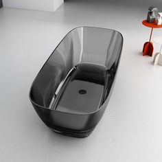 a bath tub sitting on top of a white floor