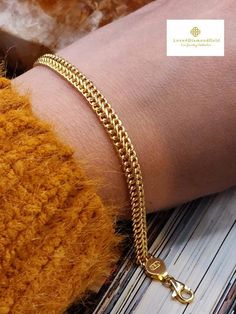 Add a hint of luxury to your ensemble with this  minimalist chain bracelet . Crafted in 18k Gold.  *Gold Weight: Approximately 4.22grams *Width: Approximately 5.1-5.2mm *LENGTH: Approximately 7 1/2 Inches and/or 7 1/4 Inches Metal is madr of 18K Gold. NOT gold filled. NOT gold plated. NOT gold vermeil. Hallmarked.  💥PLS FOLLOW US AND CHECK OUR OTHER LISTINGS. WE HAVE NEW STOCKS LISTED DAILY/WEEKLY.  📬S H I P P I N G WE SHIP WITHIN 24 HOURS. Free shipping in the US and International orders. Minimalist Gold Chain Bracelet For Everyday Luxury, Minimalist Gold Plated Curb Chain Bracelet, Minimalist Gold-plated Curb Chain Bracelet, Elegant Everyday Gold Curb Chain Bracelet, Adjustable Gold Chain Bracelet For Everyday Luxury, Elegant Curb Chain Gold Bracelet, Elegant Adjustable Gold Bracelet With Curb Chain, Luxury Delicate Chain Bracelet Gift, Minimalist Gold Plated Curb Chain Bracelets