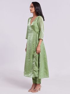 Elevate your ethnic wardrobe with our incredible sea green organza festival wear a kurta with pants. This stunning ensemble features a sea green organza kurta with fancy lace borderwork, paired with a matching sea green organza pant. The kurta is fully stitched and available in sizes ranging from XS to XXL, ensuring a perfect fit for every body type.
The sea green color of this outfit is perfect for festivals, parties, and events. The intricate lace border work adds a touch of elegance, making i Green Tissue Silk Palazzo Set For Eid, Festive Green Tissue Silk Palazzo Set, Green Tissue Silk Palazzo Set For Festive Occasions, Spring Anarkali Tissue Silk Kurta, Green Kurta With Sheer Dupatta For Festivals, Festive Green Tissue Silk Kurta, Green Organza Kurta With Traditional Drape, Fitted Green Kurta In Cotton Silk, Green Tissue Silk Kurta For Eid