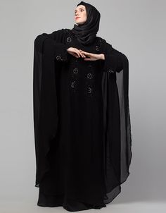 Black Shine Nida Black Embroidery Abaya for Party very comfortable and easy to wear fit for all daily wear Abaya Back close with loop, button & zip, easy to wear Dress belongs to the embroidery work with glass stone at the front and sleeves Hijab and band shown in the image can be bought separately Fabric: PartyCare: Mild machine wash/ hand Cold Wash/Dry cleanWe request customers to carefully choose the correct size and dress length referring to our size chart Black Long Sleeve Kaftan For Eid, Traditional Black Maxi Length Thobe, Black Long Khimar For Eid, Black Maxi Length Thobe For Eid, Long Black Abaya For Eid, Black Maxi Length Kaftan With Dabka, Black Khimar For Eid, Black Long Sleeve Khimar For Eid, Long Sleeve Black Khimar For Eid