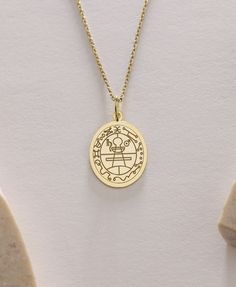 Gold  Gold Seal Of Solomon -Gold Seal Of Solomon Necklace ● Material of pendant: Solid Gold 14k ( REAL GOLD ) ● Metal Stamp: 14k ( REAL GOLD ) ● The pendant is available in 5sizes: - 12x17 mm / 0,47 x 0,66 inches - 13x18 mm / 0,51 x 0,70 inches  In the photos - 14x19 mm / 0,55 x 0,74 inches  - 16x21 mm / 0,62 x 0,82 inches  - 18x24 mm / 0,70 x 0,94 inches ( In the photos the size is 13x18 mm / 0,51 x 0,70 inches ) ( Jump Ring inner diameter: 4 mm ) ● Material of chain: Solid gold 14k ( REAL GOLD ) It is thin and dainty and it is available in 4 sizes: - 40 cm / 15,75 inches ( Length ) - 45 cm / 17,72 inches ( Length ) In the photos - 50 cm / 19,68 inches ( Length ) - 55 cm / 21,65 inches ( Length ) ● Backside engraving is FREE ( Please use the personalization box for that.) ● If you want la Symbolic Charms Necklaces For Commemoration, Symbolic Charms Necklace For Commemoration, Symbolic Oval Charm Necklaces, Symbolic Oval Necklaces With Charms, Spiritual Charms Necklaces For Commemoration, Symbolic Locket Necklace For Anniversary, Commemorative Amulet Necklaces With Round Shape, Amulet Style Commemoration Necklace With Round Shape, Amulet Pendant Necklace For Commemoration