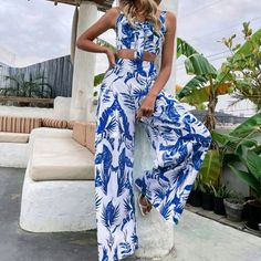 Blue & White Tropical Print Tie Front Cami Top & Wide Leg Pants 100% Polyester Caribbean Outfit, Tie Front Cami Top, Maroon Romper, Caribbean Outfits, Chambray Jumpsuit, Wide Leg Lounge Pants, Textured Leggings, Black Capri Leggings, Ruffle Jumpsuit