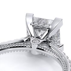 an engagement ring with two princess cut diamonds