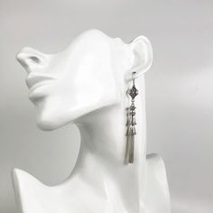 925 Sterling Silver Handmade Artisan Crafted Filigree Dangle Drop Tassel Earrings Material: 925 Solid Sterling Silver, 925 Stamped Earrings Length: 3.30 inches Width: 0.35 inches Finishing: Oxidized and Polished Comes with a gift pouch and box Free Domestic Shipping We hope that you enjoy our exclusive artisan handcrafted jewelry. Elegant Silver Tassel Earrings Nickel Free, Elegant Silver Nickel-free Tassel Earrings, Elegant Silver Tassel Earrings For Gift, Silver Metal Chandelier Earrings With Tassels, Elegant Plug Earrings With Latkans For Party, Silver Elegant Tassel Drop Earrings, Elegant Silver Earrings With Tassels, Elegant Silver Tassel Drop Earrings, Silver Tassel Wedding Earrings