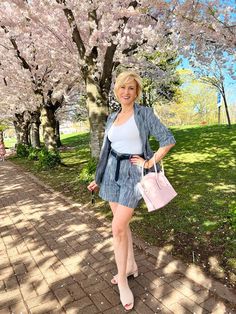 Discover the magic of combining shorts and jackets into the perfect spring ensemble for the fashion-forward over 50 lady! 💃 Transform your wardrobe and embrace the season's trends with this stylish outfit inspiration that'll have heads turning. 🌼👜 Ready to step up your style game? Get this look! ✨ Dressy Shorts