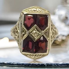 "VINTAGE 14K WHITE GOLD ANTIQUE GARNET ART DECO COCKTAIL RING BEAUTY!!     Size 5.25     Each garnet measures approximately 5mm x 4mm     Ring face measures 3/4\" high x 6/16\" wide.     3.6 grams One of the garnets are scratched across (see pics). Not cracked through. Shipped insured/delivery confirmation I guarantee item to be exactly as described and pictured." Art Deco Cocktail, Black Opal Pendant, Purple Stone Rings, Gold Apple, Black Gift Boxes, Purple Stones, Cute Rings, Opal Pendants, Black Opal