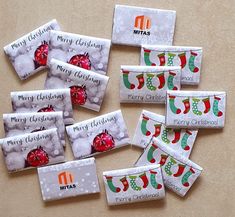 christmas candy bar wrappers are laid out on the table with merry stockings and stocking