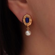 "Introducing our exquisite Dainty Lapis Lazuli Earrings with Pearl Drops, inspired by the elegance of the Victorian era. These delicate earrings are crafted from high-quality sterling silver and feature stunning lapis lazuli gemstones paired with graceful pearl drops. With their timeless charm and intricate design, they make for the perfect Christmas gift, sure to delight and enchant. Elevate your style with these dainty earrings that effortlessly combine vintage allure and modern sophistication. DETAILED DESCRIPTION// EARRINGS: Material: 925 sterling silver  Finish: 18k gold  Stone: Natural blue Lapis lazuli and freshwater pearls (As they are crafted with natural stones, each one may have slight differences.) Lapis lazuli size:4*6mm Freshwater pearls size: 6mm NECKLACE: Material: 925 ster Lapis Lazuli Earrings Gold, Blue Fine Jewelry Pearl Earrings As Gift, Elegant Gold Lapis Lazuli Earrings, Elegant Sapphire Jewelry With Cabochon, Elegant Blue Cabochon Jewelry, Elegant Lapis Lazuli Jewelry For Anniversary, Elegant Lapis Lazuli Jewelry For Formal Occasions, Elegant Blue Cabochon Earrings, Elegant Formal Lapis Lazuli Jewelry