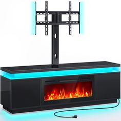 a tv stand with a fire burning in it