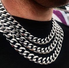 13MM  Super Thick Cuban Silver Curb Chain. This striking piece is going to take centre stage on your outfit. Be bold and rock this on its own or with a combination of silver accessories- just take a look on our necklace page. Available sizes:  - 18" / 20" / 22"  we also have thick 13mm bracelet. Details: - Made from Recycled Stainless Steel - Hypoallergenic  - Super Thick  - 13mm Cuban Link Made from Premium quality stainless steel with a Polished Silver stainless steel finish. Guaranteed to nev Silver Chain Necklace Men, Thick Silver Necklace, Mens Silver Chain, Silver Cuban Chain, Mens Silver Chain Necklace, Thick Necklace, Silver Wrapping Paper, Chain Necklace Silver, Thick Chain Necklace