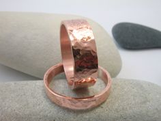 "MORE DESIGNS from ARKETIPO handmade jewelry can be found here: http://www.etsy.com/shop/ARKETIPO *THE PRICE IS FOR BOTH RINGS* These rings are HANDMADE entirely by myself in my workshop. Made from copper, designed, hammered and crafted by hand. The first ring is approximately 7mm wide and 1mm thick and the second one is 4mm wide and 1mm thick (if you want them more or less wide please firstly contact with me). You can choose words or numbers to be engraved inside of the ring ( choose the font t Handmade Rose Gold Ring For Anniversary, Round Copper Jewelry For Anniversary, Rose Gold Copper Jewelry For Anniversary, Anniversary Rose Gold Copper Jewelry, Rose Gold Copper Ring For Anniversary, 15 Rings, Wedding Rings Set, Handmade Rose, Rings Set