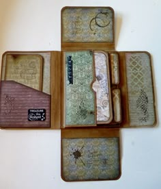 four wallets are sitting on top of each other