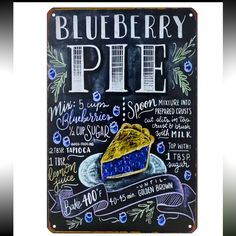 a blueberry pie sign is shown on a chalkboard