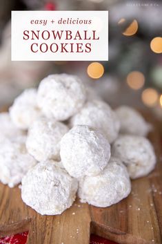 snowball cookies on a cutting board with christmas lights in the background and text overlay