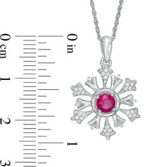 The perfect gift for your one-of-a-kind girl, this glistening snowflake pendant lends elegance to her look. Fashioned in sterling silver, this choice captivates with a dazzling 4.5mm lab-created bright red ruby center stone bordered by delicate diamond-touched tendrils. Radiant with 1/10 ct. t.w. of diamonds and a brilliant buffed luster, this sparkling keepsake suspends along an 18.0-inch rope chain that secures with a spring-ring clasp. Formal Christmas Snowflake Jewelry, Diamond White Snowflake Jewelry For Anniversary, Sterling Silver Snowflake Jewelry For Anniversary, White Gold Diamond Snowflake Jewelry, Anniversary White Gold Snowflake Jewelry, White Snowflake Fine Jewelry, Fine Jewelry Snowflake Jewelry For Anniversary, White Gold Snowflake Jewelry For Christmas, Christmas White Gold Snowflake Jewelry