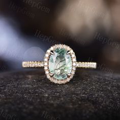 Oval Green Moss Agate Engagement Ring Art Halo Rose Gold Silver Bridal Moissanite Ring Promise Anniversary Eternity Wedding Ring For Women Remark: Please note the formation of natural gemstones.It may take thousands of years when the flaws happen inevitably by the complex geological condition's change.it is also proved that gem is natural. That makes no 2 stones could be exactly the same and perfect also the color may be different shown by light and sight. So our pictures only show you the stone Emerald Cut Aquamarine Gemstones For Wedding, Emerald Cut Aquamarine May Birthstone For Wedding, Emerald Cut May Birthstone Gemstones For Wedding, Emerald Cut Wedding Gemstones With Accent Stones, Emerald Cut Gemstones With Halo Setting For Wedding, Green Diamond Halo Ring For Wedding, Green Wedding Gemstones With Accent Stones, Oval Emerald Gemstones For Wedding, Oval Emerald Wedding Gemstones