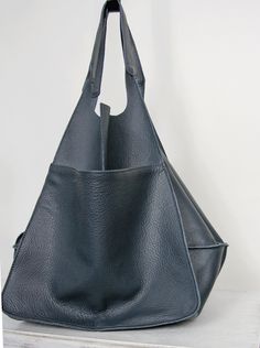 "Oversized Bag - Large Leather Tote Bag - XXL Handbag OVERSIZE STYLISH TOTE BAG made from high quality natural leather. Very roomy interior provides a lot of space for all the daily essentials and more. It is large enough to hold all your weekend essentials. This bag is a great option as your everyday bag. It can fit A4 files, books, magazines, cosmetic bag, accessories, your Macbook / Ipad and other electronic devides. Inside there are 2 pockets for mobile phone and another one with zipper for Everyday Blue Soft Leather Bucket Bag, Daily Soft Leather Hobo Tote Bag, Everyday Soft Leather Hobo Tote Bag, Modern Blue Hobo Bag With Leather Handles, Versatile Blue Leather Hobo Bag, Modern Blue Soft Leather Hobo Bag, Blue Leather Backpack With Large Capacity For Everyday Use, Large Capacity Blue Leather Backpack For Everyday Use, Blue Soft Leather Hobo Bag For Everyday