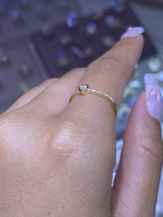 MaterialsGold, Diamond DescriptionUp for sale is a beautiful 14K Gold Bezel Diamond Heart Band. Specifications:-Model #: DHODS550-Metal Type: Rose, Yellow, and White Gold-Metal Purity: 14K-Band Width: 1MM-Gold Weight: 1.19 grams, approx. depending on ring size-Total Diamond Weight: 0.15 carats approx.-Color: F-G-Clarity: SI Brief Overview:-Free Sizing W/ Purchase-14 Day Return Policy-Conflict Free Diamonds-Satisfaction GuaranteeSatisfaction Guarantee:David's House of Diamonds is dedicated to bri Luxury Heart Cut Cubic Zirconia Wedding Ring, Trillion Cut Yellow Gold Diamond Jewelry, Trillion Cut Diamond Jewelry In Yellow Gold, Gold Heart Ring With Bezel Setting - Fine Jewelry, Luxury White Heart Ring With Diamond Accents, Luxury Yellow Gold Heart Ring, Valentine's Day Gold Jewelry With Single Diamond, Valentine's Day Single Diamond Gold Jewelry, Diamond Heart Ring With Single Diamond