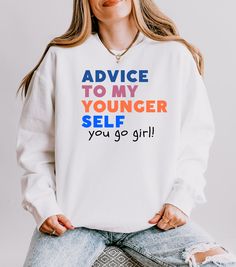 Empower yourself and others with this inspirational "Advice to my younger self: You go girl" crewneck. This motivational tee is designed to boost self confidence and encourage female empowerment. Perfecct for any woman who wants to wear her feminist fashion with pride. Whether you're looking for an inspiring quote shirt or a piece of empowering clothing, this sweatshirt makes a bold statement. Ideal for casual wear or as a thoughtful gift, this women's apparel piece reminds everyone to embrace t Inspirational Advice, Boost Self Confidence, Womens Empowerment, To My Younger Self, Feminist Fashion, Younger Self, Self Love Club, You Go Girl, Quote Shirt