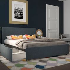 a bedroom with a bed, dresser and rug in the middle is painted dark blue