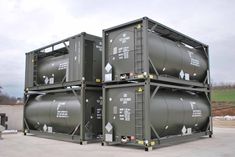 three cargo containers stacked on top of each other