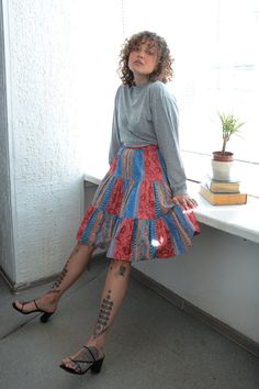 Vintage multicolour patterned patches style midi zip fastening on the back cotton skirt. UK size not written but looks flexible like 8-10. Model size on the photo is 8. Measurements: length 24 inches, waist 27 inches, hips 46 inches. Casual Cotton Mini Skirt With Patchwork, Multicolor Cotton Lined Skirt, Cotton Midi Skirt With Patchwork, Vintage Patchwork Skirt, Multicolor Flared Cotton Mini Skirt, Multicolor Cotton Flared Mini Skirt, Patchwork Cotton Midi Skirt, Multicolor Tiered Cotton Mini Skirt, Multicolor Cotton Mini Skirt With Lining