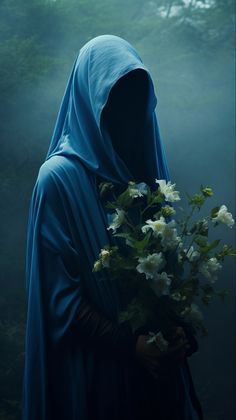 a woman with a blue veil holding flowers