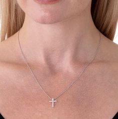 With a simplistic yet beautiful design, the 18k white gold Medium Signature Cross Diamond Necklace. Approx. Total Carat Weight: 0.32STYLE: HFPSIGCR00328W White Gold Necklaces With Brilliant Cut In Platinum, White Gold Platinum Necklace With Brilliant Cut, Fine Jewelry White Gold Necklace With Prong Setting, White Gold Sterling Silver Fine Jewelry Necklace, White Platinum Solitaire Necklace, Fine Jewelry White Platinum Necklace, Fine Jewelry Platinum White Gold Necklace, Modern Sterling Silver Diamond Necklace In White Gold, Fine Jewelry Platinum Necklace In White