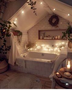 a bathroom with lights on the ceiling and a jacuzzi tub