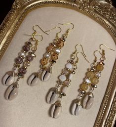 🌹Handmade Cowrie Shell Beaded Dangle Earrings 🌹Length: 2 1/2 inches Care: 🥀Remove when showering. Cowry Shell Jewelry, Romantic Classic Style, Glam Barbie, Earthy Earrings, Earrings Handmade Boho, Gel Hair, Boho Witch, Eye Contacts, Beaded Rosary