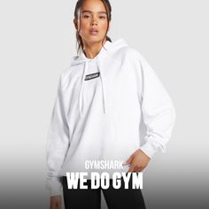 NEW KID ON THE BLOCK With bold Gymshark branding, style your Block pieces with anything and wear for your next training or rest day. • Adjustable drawcord hood SIZE & FIT• Oversized fit• Model is 5'6" and wears a size S MATERIALS & CARE• 80% Cotton, 20% Polyester SKU: B6A3E-WB86 Rest Day, New Kids On The Block, Oversized Hoodie, White Hoodie, Oversize Hoodie, The Block, New Kids, Fitness Models, White Black