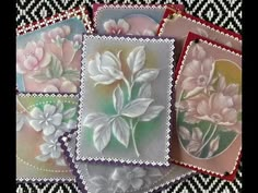 four handmade cards with flowers on them