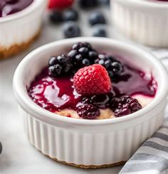 berry cheesecake in a bowl with berries on top