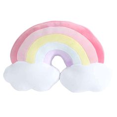 a rainbow shaped pillow sitting on top of a white floor next to a pink and yellow cloud