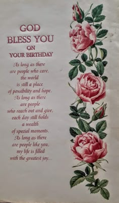 a card with roses on it that says, god bless you on your birthday