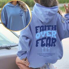 Introducing our inspiring "Faith Over Fear" hoodie, designed to uplift and encourage. This cozy hoodie features a meaningful symbol on the front, representing "God Is Greater than the Highs and Lows," reminding you of God's constant presence in every situation. On the back, the empowering phrase "Faith Over Fear" is paired with Psalm 34:4: "I sought the Lord, and he answered me; he delivered me from all my fears." Wear this hoodie to stay warm and share a message of faith, courage, and divine re Bible Verse Aesthetic, Wood Crosses Diy, Verse Aesthetic, Crosses Diy, Psalm 34 4, Bible Verse Inspirational, Christian Sweatshirts, Aesthetic Christian, Deliver Me