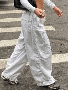 ⚡Buy 2023 Low Waist Baggy Wide Leg Cargo Pants White M under $38.00 in Pants at AnotherChill.com Online. Style: Casual/Street/Punk/Hip Pop/Grunge/Y2K. Fabric Content: Polyester, Spandex. Fit Type: Relax fit. : Get ready to rock your street-style game with these size-friendly parachute cargo pants. Designed for comfort and versatility, these pants feature a relaxed silhouette and a low waist that flatters your figure. The elasticated waist ensures a comfortable fit, while the functional pockets p Celana Kargo, Hip Hop Trousers, Pink Cargo Pants, Y2k Cargo Pants, Celana Fashion, Streetwear Cargo Pants, Cargo Pants Streetwear, Y2k Pants, Baggy Cargo Pants