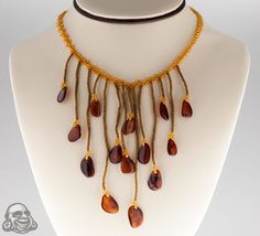 Baltic amber necklace Amber Polished Beads Necklace For Gifts, Elegant Brown Necklace With Stones, Amber Pendant Necklace With Polished Beads, Single Strand Amber Necklace For Gift, Amber Single Strand Necklace For Jewelry Making, Elegant Brown Dangle Necklaces, Adjustable Long Amber Necklace, Amber Drop Gemstone Necklace, Handmade Brown Sterling Silver Necklace