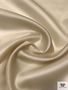 the white silk is very soft and smooth, but it doesn't look like any fabric