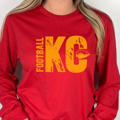 Kansas City Football Long Sleeve Tee is the perfect gift for her for her birthday, Christmas, or a football game! T-shirt: This is made with the Bella & Canvas 3001 classic unisex jersey short sleeve tee.  It fits like a well-loved favorite, soft cotton and quality print make users fall in love with it over and over again. These t-shirts have-ribbed knit collars to bolster shaping. The shoulders have taping for better fit over time. Dual side seams hold the garment's shape for longer.  .: 100% A School Spirit Long Sleeve T-shirt For Football Season, Long Sleeve Letter Print T-shirt For Football Season, Sports Fan Long Sleeve T-shirt With Letter Print, Long Sleeve T-shirt With Letter Print For Football Season, Kc Chiefs Shirts Women, Football Shirt Women, Long Sleeve Letter Print Football T-shirt, Kansas City Chiefs Sweatshirts, Kc Chiefs Leopard Shirt