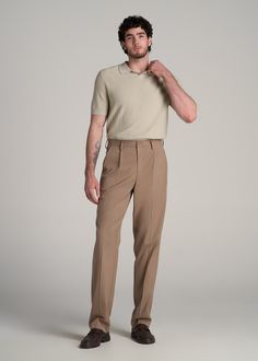 About Our Tall Men's Relaxed Tapered Pleated Trouser The Go-To Pants for Tall Men For the guy over 6' who values both style and comfort, these relaxed tapered pleated slacks for tall men are a game-changer. Designed specifically for the unique needs of tall guys, they offer a sophisticated look without sacrificing comfort. Embrace a modern style of men's tall pants that stands out in any setting.• Modern tapered fit• Versatile design for both casual and formal settings• Sustainably made with 68% Relax Fit Pants Men, Mens High Rise Pants, Men's High Waisted Pants, Tailored Trousers Mens, Men's Quiet Luxury, Men’s Pants Fashion, Men Trouser Design, Relaxed Fit Pants Outfit Men, Light Business Casual