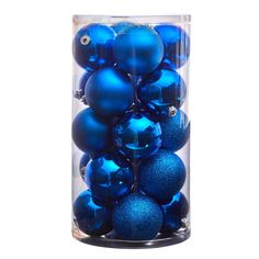 blue christmas ornaments in a clear glass container