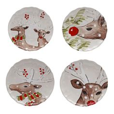 four plates with reindeer designs on them