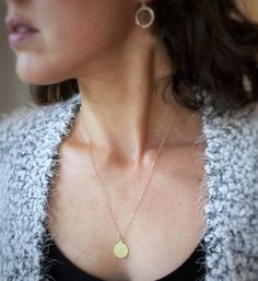 "The tiny circle pendant disc is weighted nicely despite it's small size. While the 14K gold filled chain is delicate looking, it is very strong and will hold up to everyday wear. This necklace is perfect as a gift, for a wedding or as a bridesmaids gift. Each necklace will arrive arranged on a keepsake card and enclosed in a matte black gift box - free \"bridesmaid thank you cards\" are provided as well. ►Chain is 1.4mm flat cable chain, pendant diameter is 12mm ►Model wearing 20 inch chain ►Me Cheap Round Charm Necklace With Chain, Round Charm Necklace With Adjustable Chain, Luxury Gold Round Disc Necklace, Minimalist Chain Necklace With Large Pendant, Minimalist Chain Necklace With Large Pendant As Gift, Round Charm Necklace With Large Pendant As Gift, Charm Necklaces With Large Round Pendant For Gifts, Everyday Jewelry With Coin Pendant, Everyday Round Disc Coin Pendant Jewelry