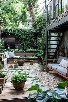 an outdoor living area with lots of plants