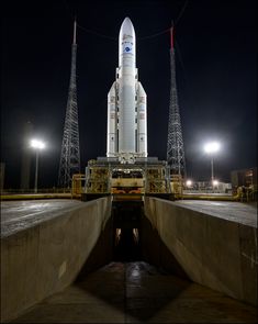 the space shuttle is on display at night