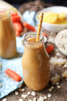 two mason jars filled with peanut butter and carrots